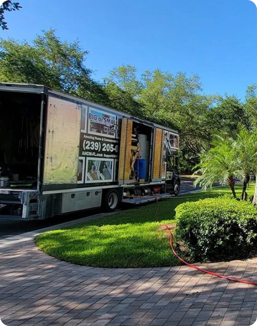 Service truck parked on suburban driveway
