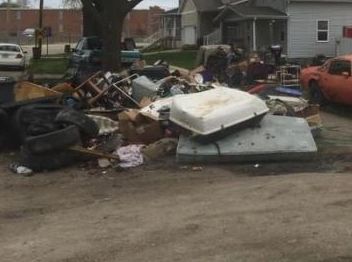 Pile of discarded furniture and debris