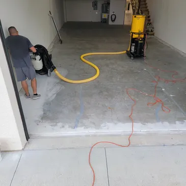Garage concrete floor grinding with dust collector