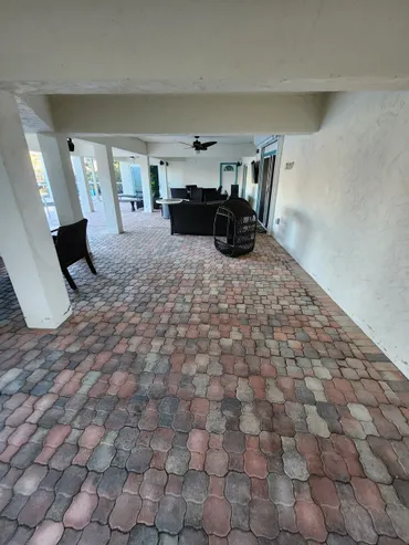Covered patio with patterned paver flooring