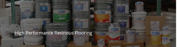 Buckets of resinous flooring supplies on shelves