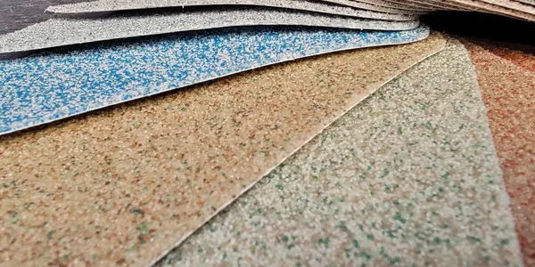 Assorted sandpaper sheets in varying grits