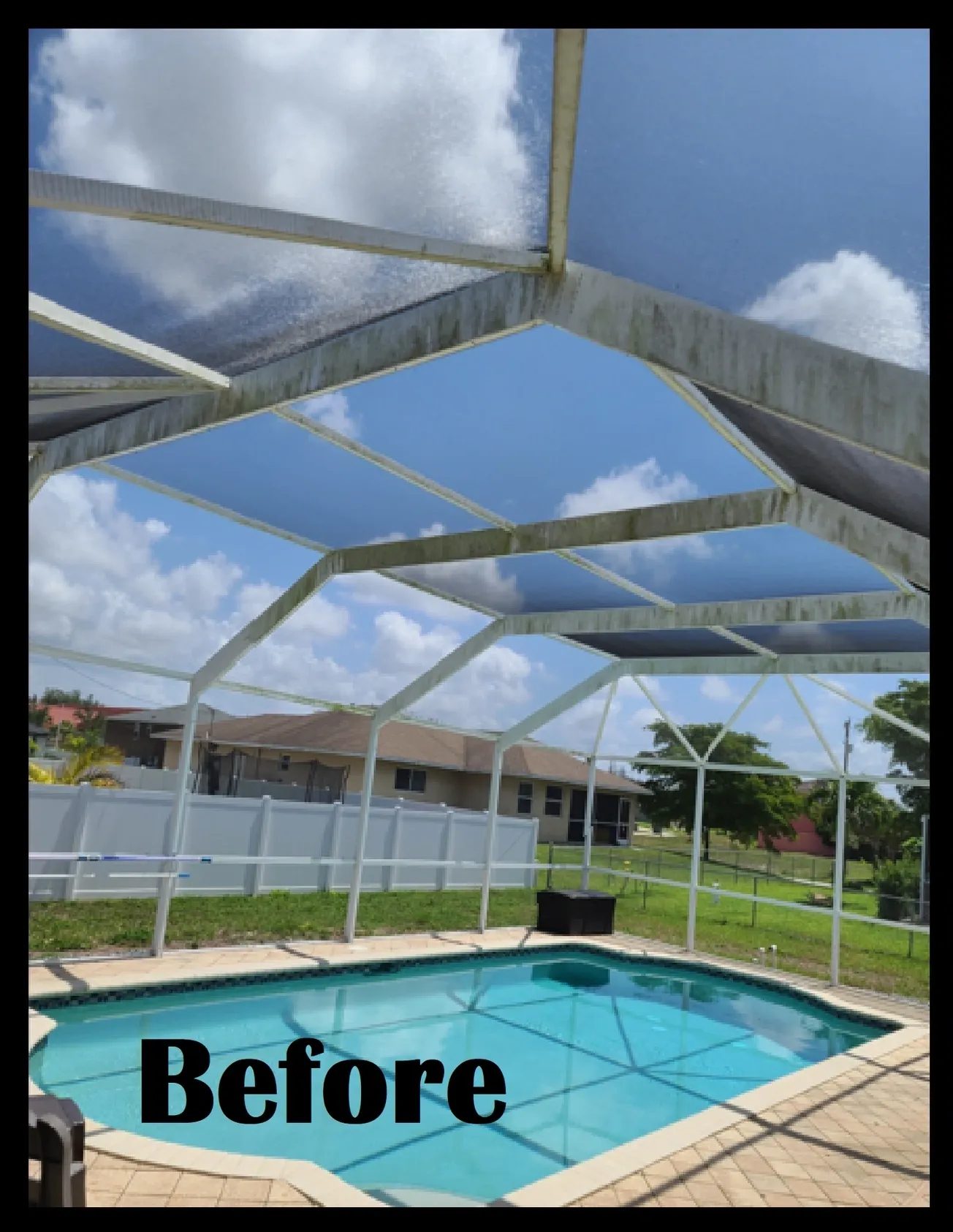 Backyard pool with missing screen enclosure