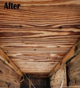 Refinished wood ceiling with pronounced grain