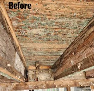 Old wooden ceiling with peeling paint