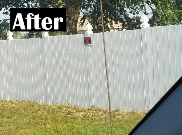 White vinyl privacy fence with mailbox