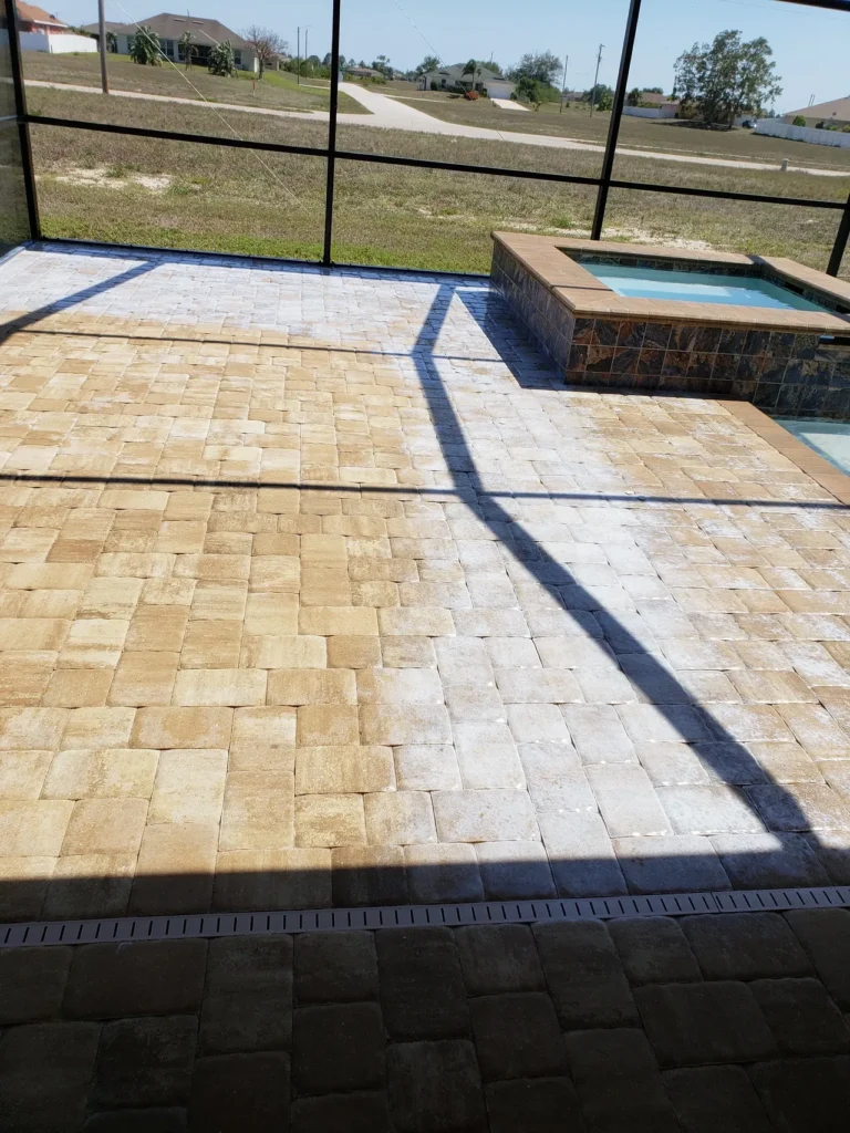 Enclosed paver patio with raised spa