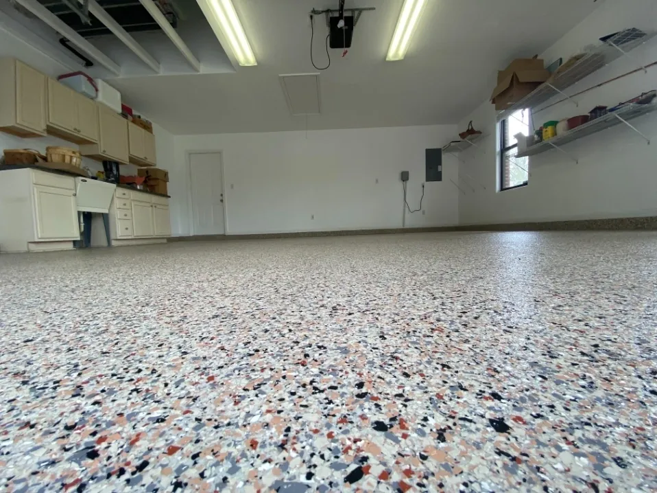 Clean garage with speckled epoxy floor