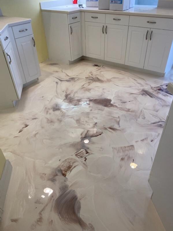Glossy marbled brown-beige epoxy kitchen floor