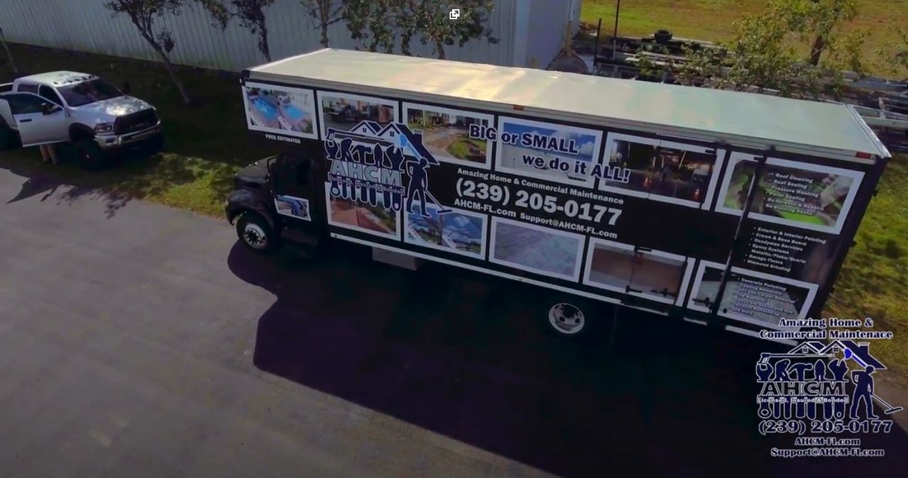 Parked moving truck with colorful company advertising