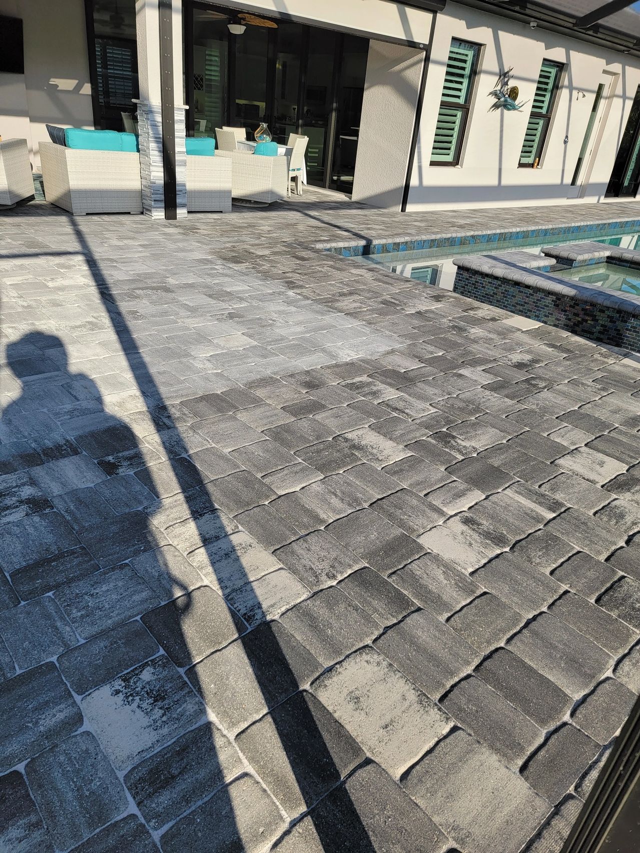 Poolside patio with lounge seating