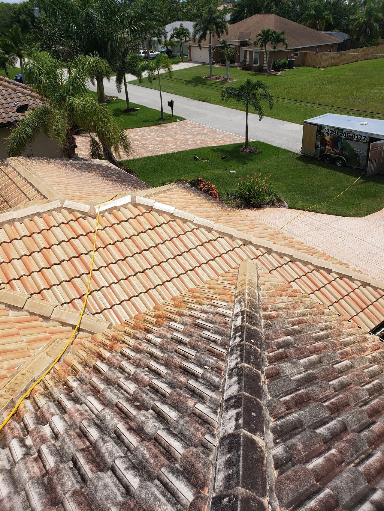 Tile roof ridge with neighborhood street view