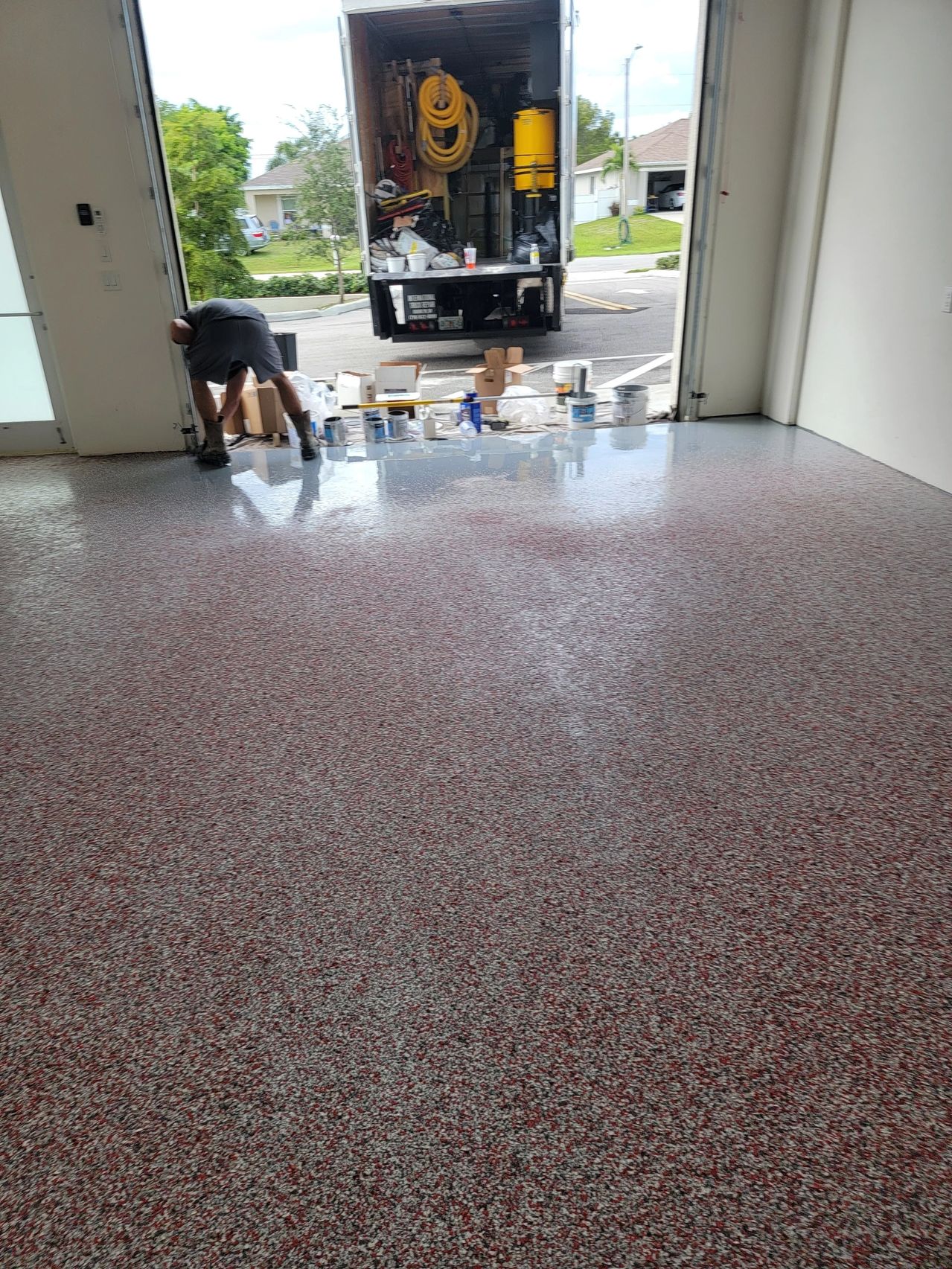 Fresh speckled epoxy garage floor installation