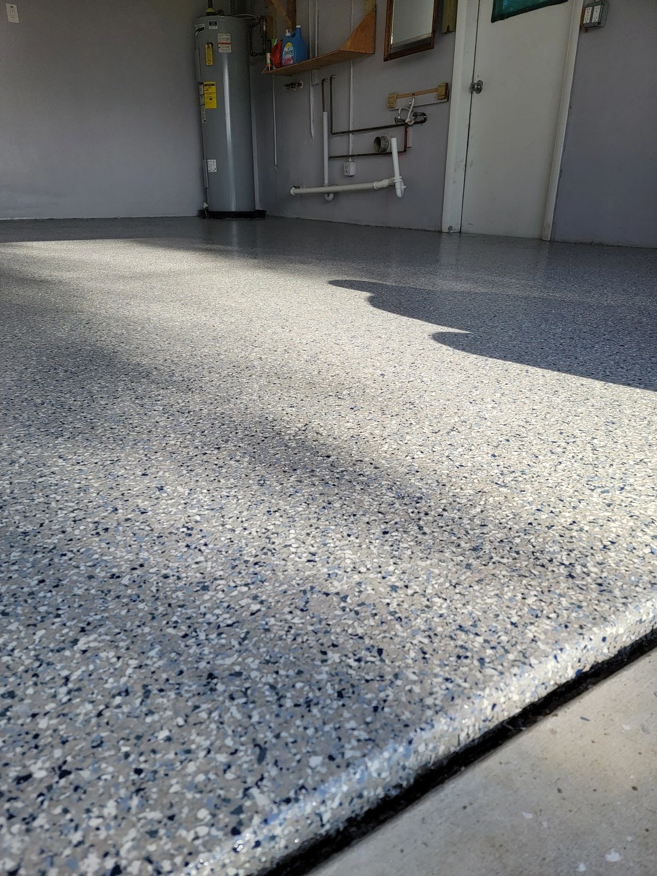 Close-up of speckled epoxy garage floor