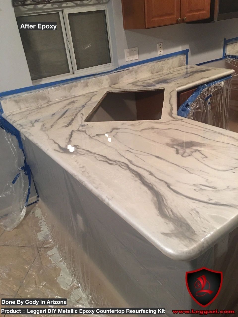 Marble-look epoxy kitchen countertop with sink cutout