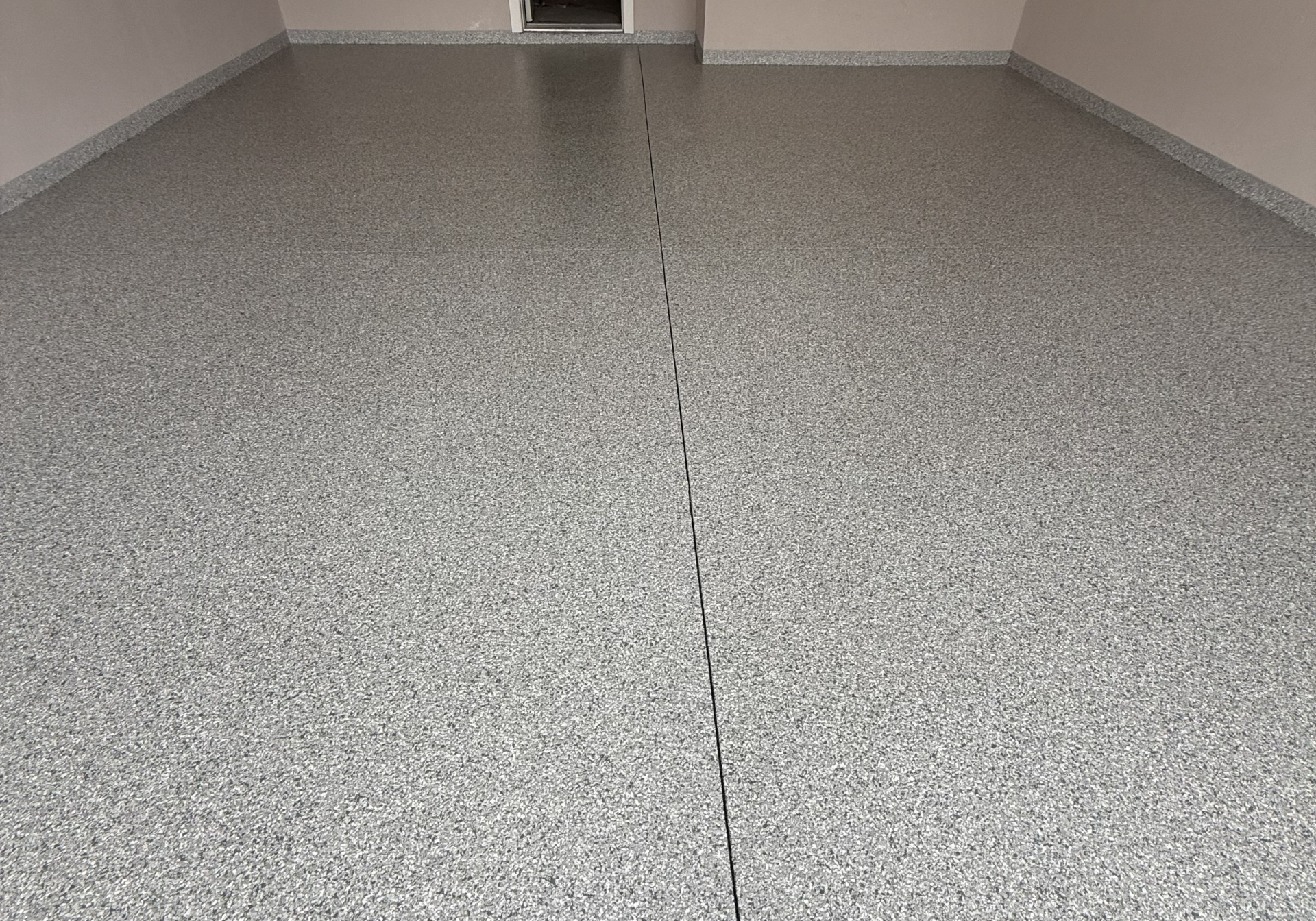 epoxy garage floor coating with our add on cove option