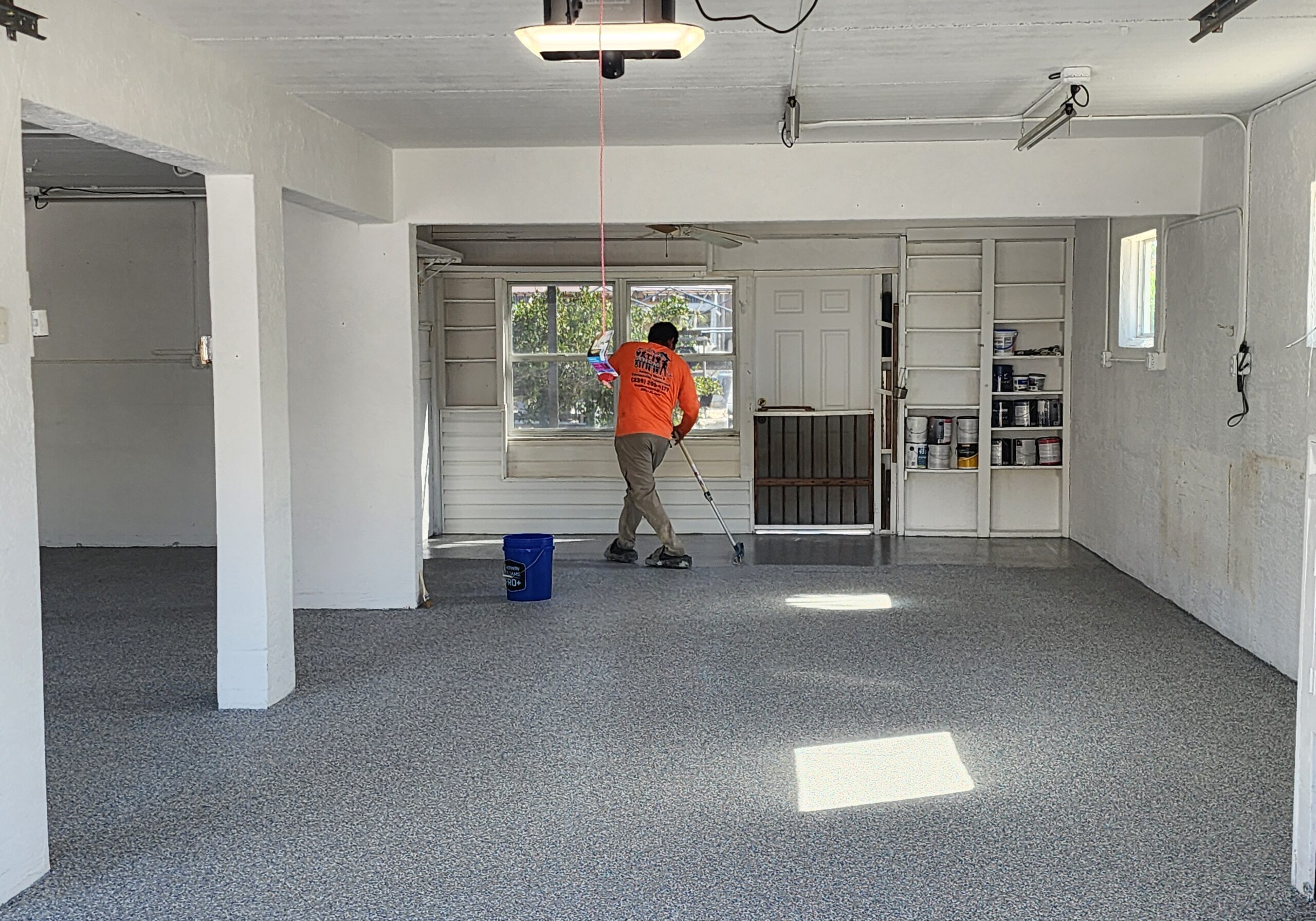 epoxy garage floor with add on with extra clear coat