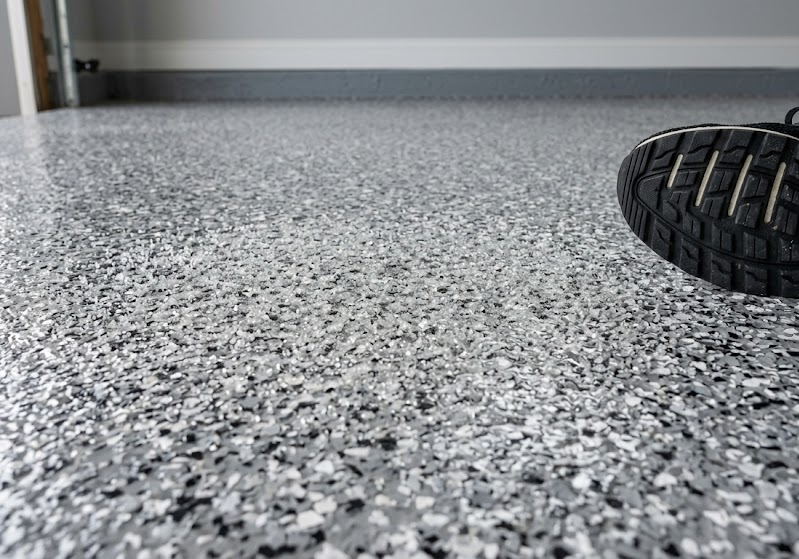 non slip installed as a add on to their epoxy garage floor coating