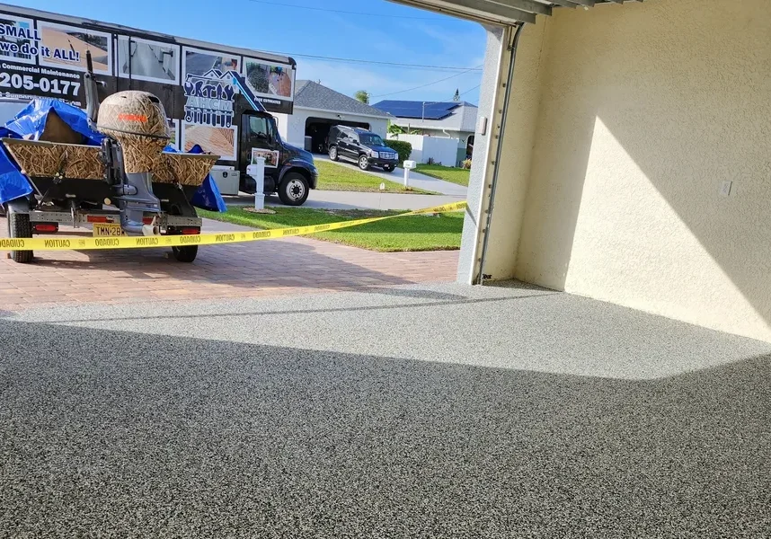 Open garage interior, caution tape, parked work truck