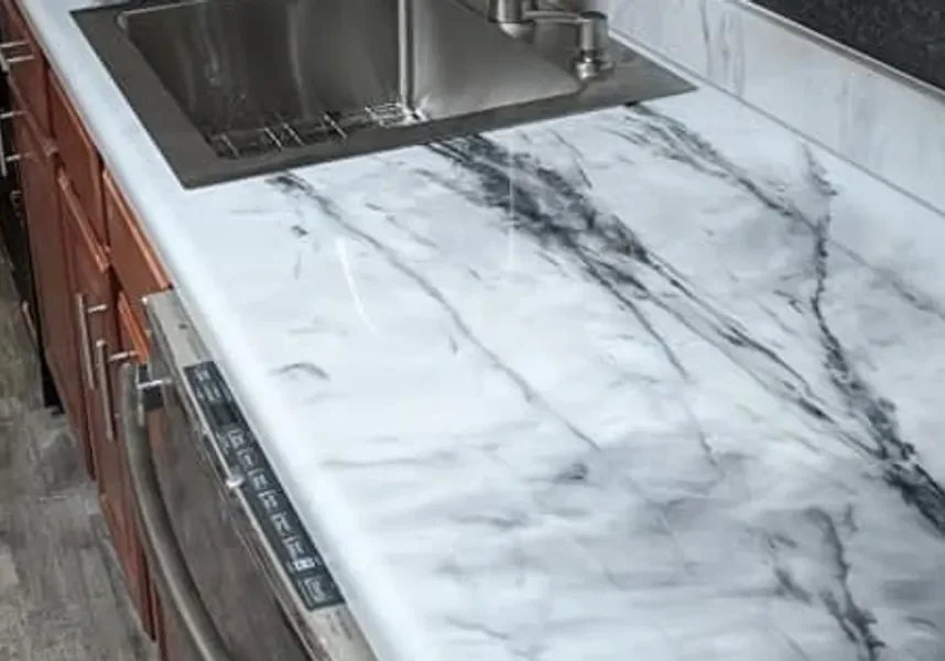 Marble pattern kitchen countertop with stainless sink