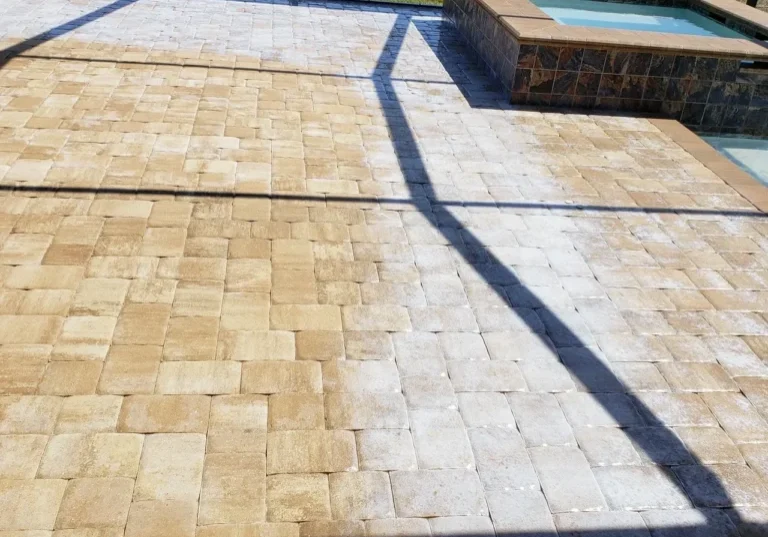 Enclosed paver patio with raised spa
