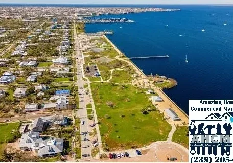 Aerial view of waterfront park and neighborhood
