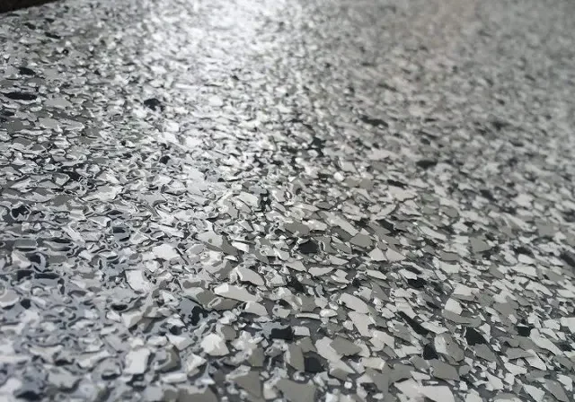 Close-up of speckled gray epoxy floor
