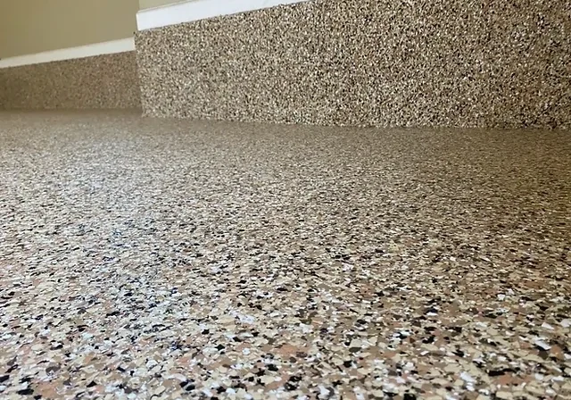 Speckled epoxy garage floor and step
