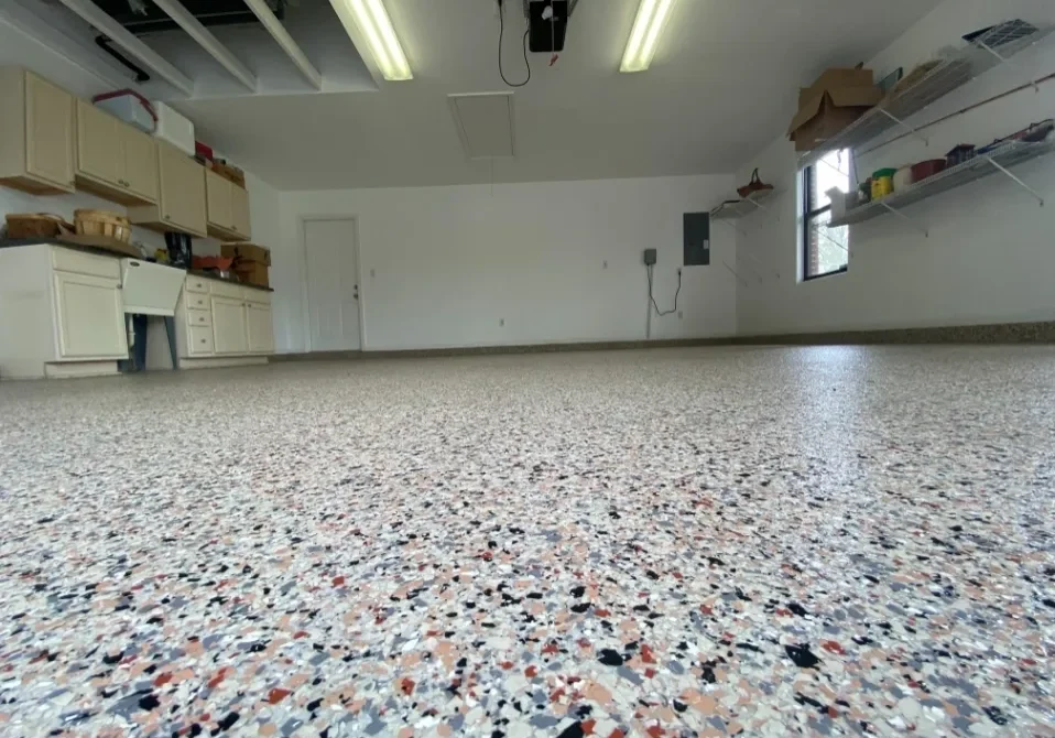 Clean garage with speckled epoxy floor